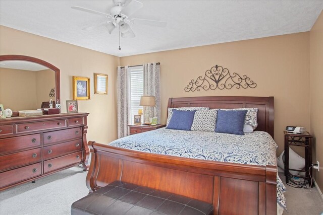 bedroom with carpet floors and ceiling fan