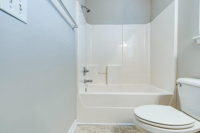 bathroom featuring toilet and washtub / shower combination