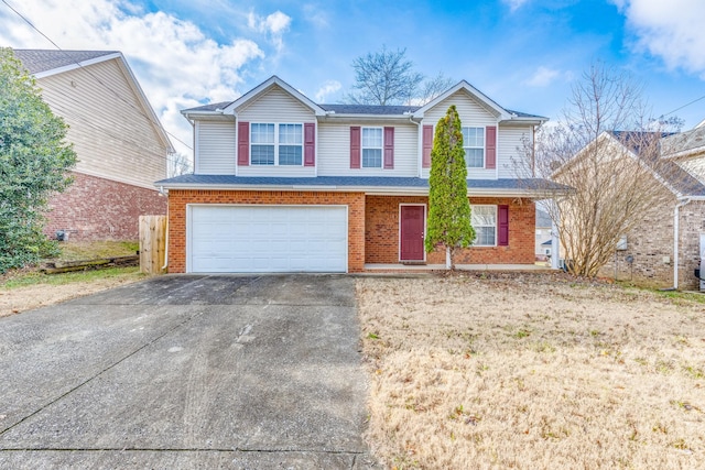 view of front of property with a garage