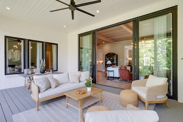 exterior space featuring ceiling fan and wooden ceiling