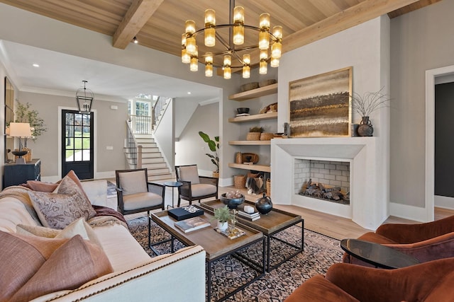 living room with beam ceiling, hardwood / wood-style flooring, built in features, an inviting chandelier, and wooden ceiling