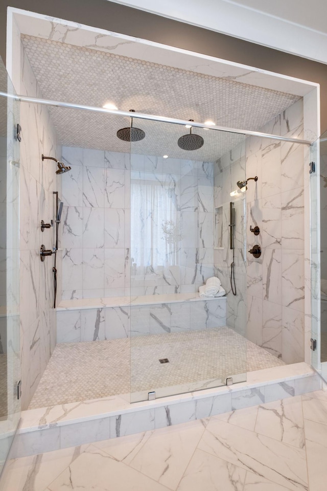 bathroom featuring an enclosed shower