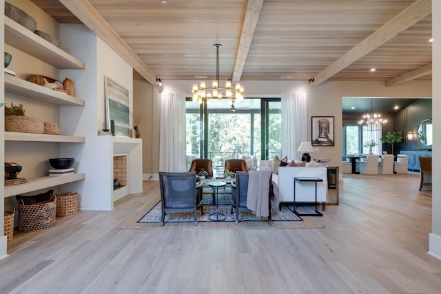 dining area with beam ceiling, light hardwood / wood-style flooring, and an inviting chandelier