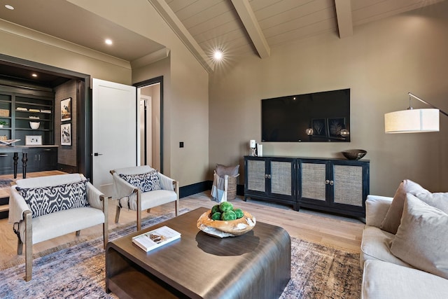 living room with built in shelves, light hardwood / wood-style flooring, wooden ceiling, and vaulted ceiling with beams