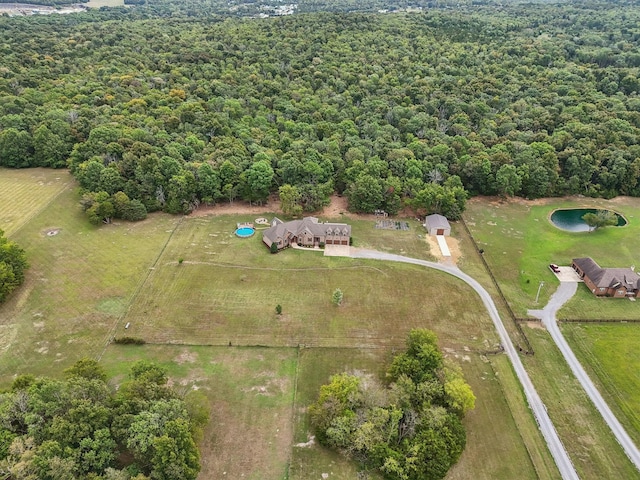 birds eye view of property featuring a rural view