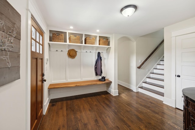 mudroom with dark wood-type flooring