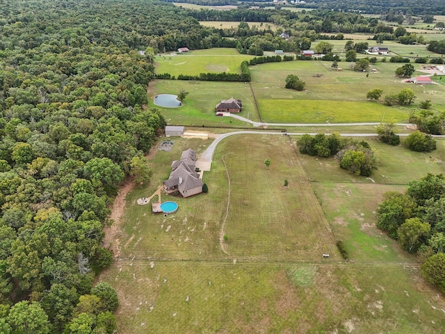 birds eye view of property featuring a rural view