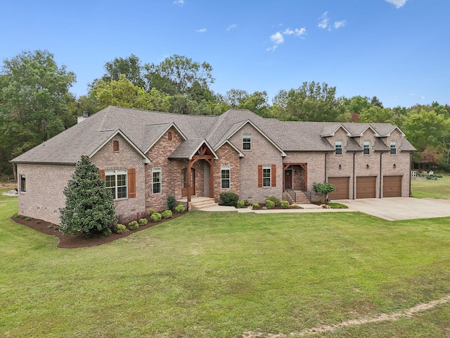 view of front facade with a front yard and a garage