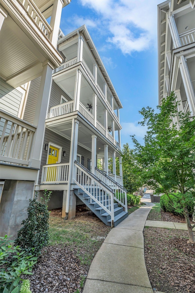 view of property exterior featuring a porch