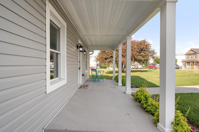 view of patio featuring a porch