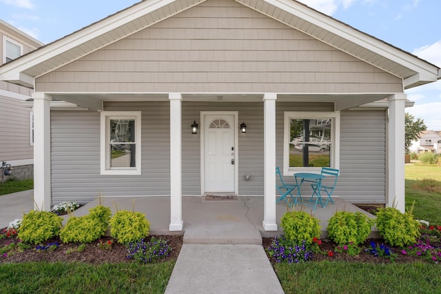 bungalow-style home with a porch