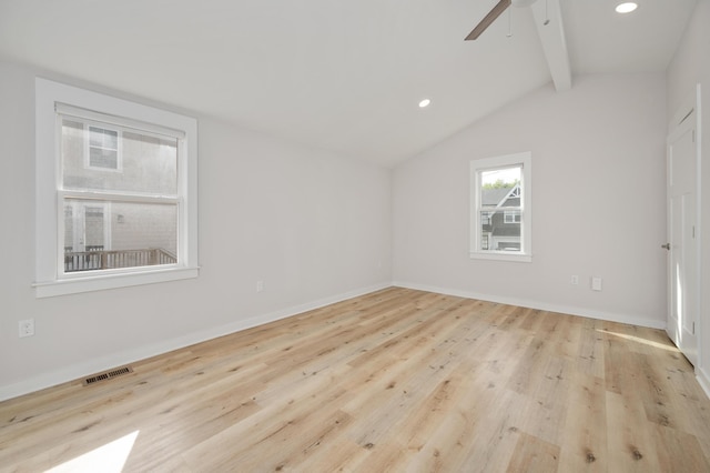 unfurnished room featuring vaulted ceiling with beams, ceiling fan, and light hardwood / wood-style floors