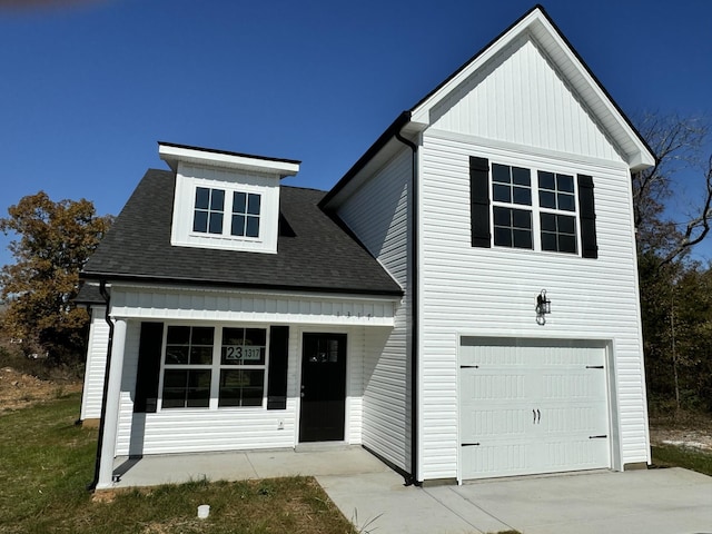 view of front of property featuring a garage