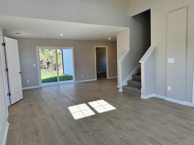 unfurnished living room featuring light hardwood / wood-style floors