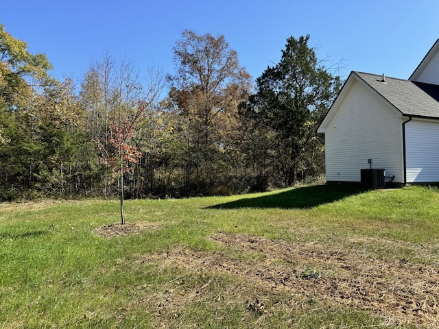 view of yard featuring central AC