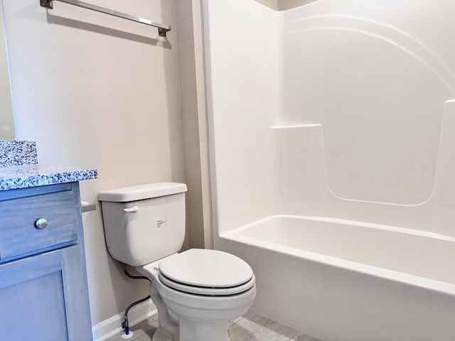 full bathroom featuring vanity, toilet, and shower / washtub combination