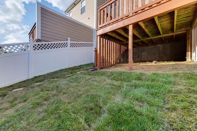 view of yard featuring a wooden deck