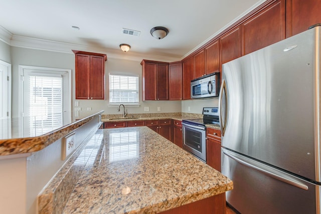 kitchen featuring light stone countertops, stainless steel appliances, crown molding, and sink