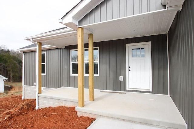 doorway to property with a porch