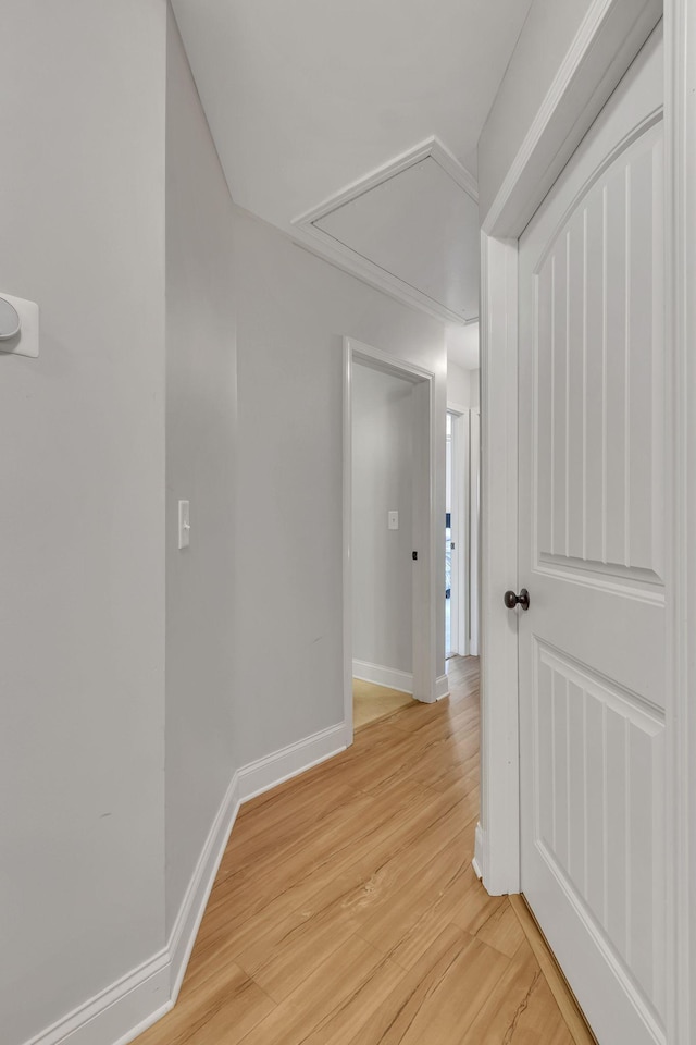 hall with light wood-type flooring