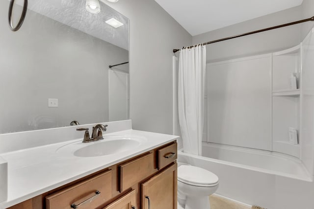 full bathroom with vanity, shower / bath combination with curtain, and toilet