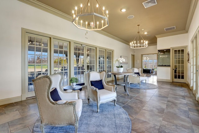 interior space with a chandelier, french doors, and a wealth of natural light