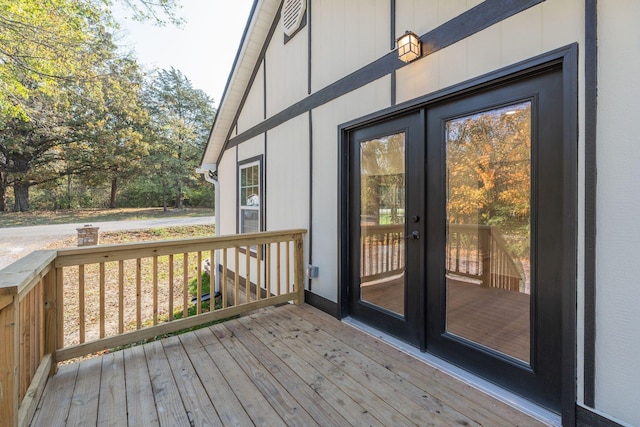 wooden terrace featuring french doors