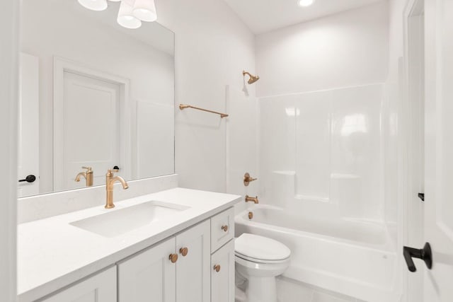 full bathroom featuring tile patterned floors, vanity, toilet, and  shower combination