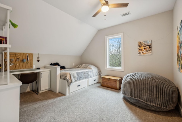 carpeted bedroom featuring ceiling fan and lofted ceiling