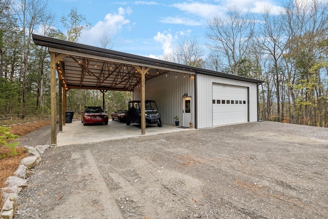 garage featuring a carport