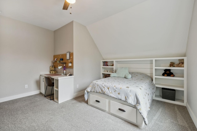 carpeted bedroom with ceiling fan and lofted ceiling