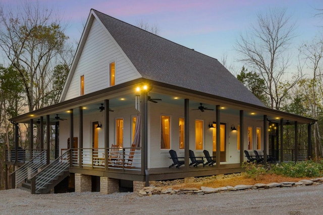 exterior space featuring a porch and ceiling fan