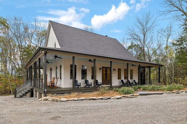 farmhouse inspired home with ceiling fan and a porch