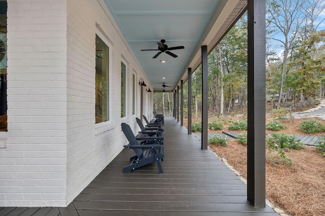 wooden deck with ceiling fan