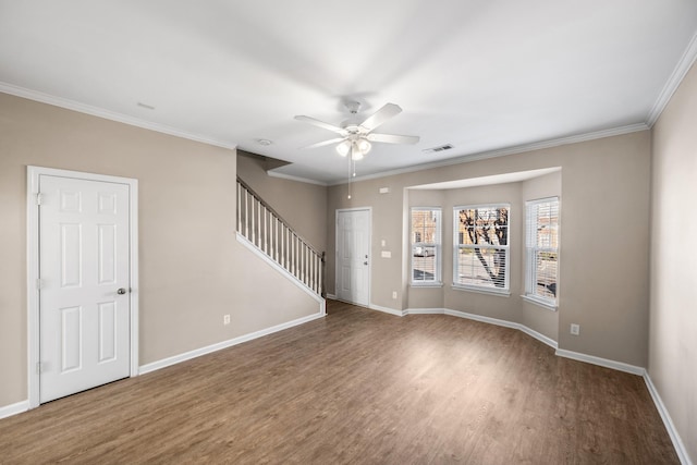 unfurnished room with ceiling fan, hardwood / wood-style flooring, and crown molding