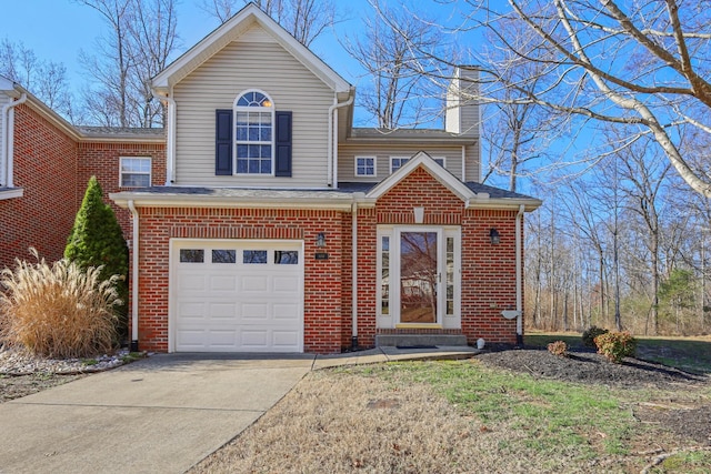 front of property with a garage