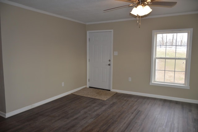 unfurnished room featuring crown molding, dark hardwood / wood-style flooring, and ceiling fan