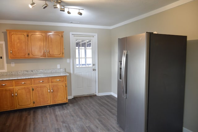 kitchen with dark hardwood / wood-style flooring, stainless steel refrigerator with ice dispenser, and ornamental molding