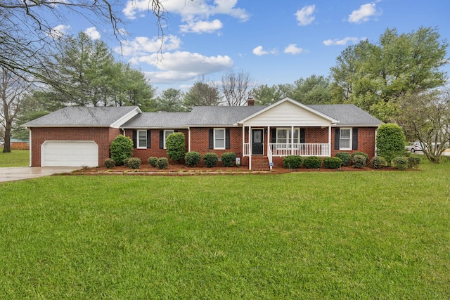 ranch-style house featuring a porch, a garage, and a front lawn