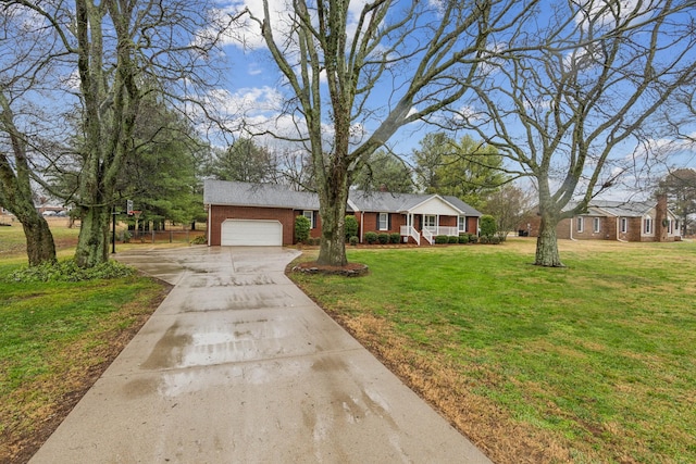 ranch-style home featuring a front yard and a garage