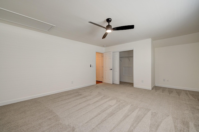 unfurnished bedroom with light colored carpet, ceiling fan, and a closet