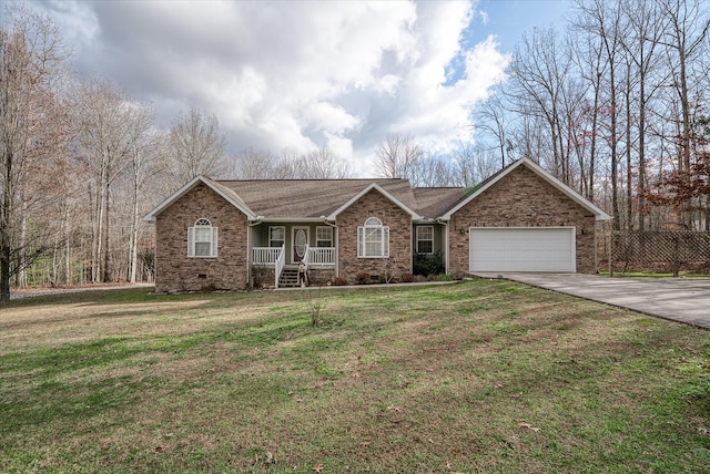 ranch-style house with a garage, covered porch, and a front lawn