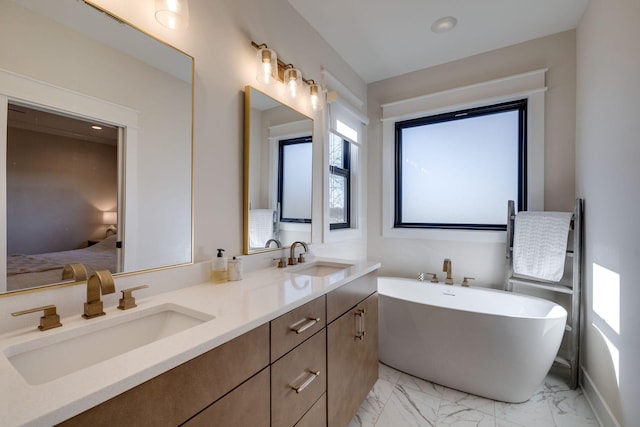 bathroom featuring a bathtub and vanity