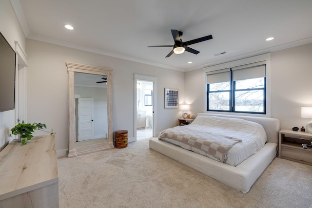 carpeted bedroom featuring connected bathroom, ceiling fan, and ornamental molding