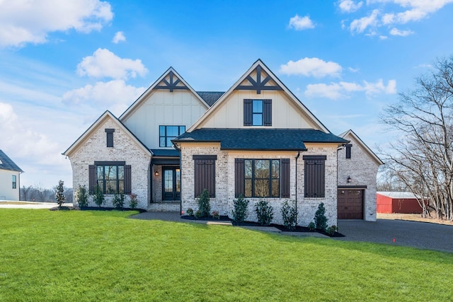 view of front facade featuring a garage and a front lawn