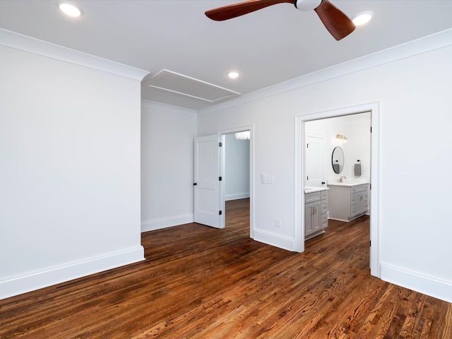 unfurnished bedroom with ensuite bathroom, ceiling fan, dark hardwood / wood-style floors, and ornamental molding