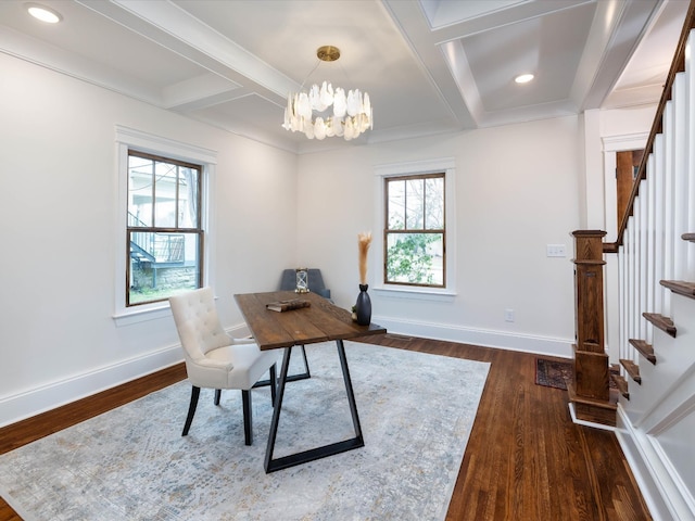 home office featuring a healthy amount of sunlight, coffered ceiling, and an inviting chandelier