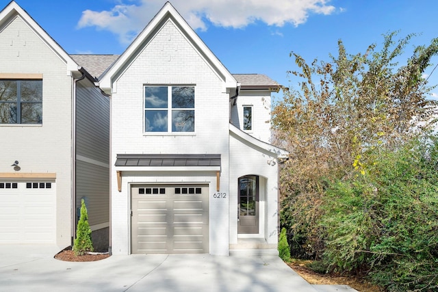 view of front of home featuring a garage