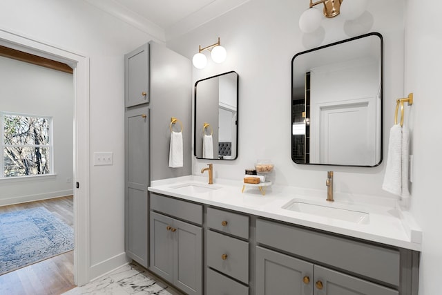 bathroom featuring vanity and ornamental molding