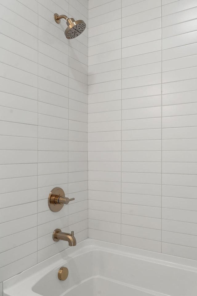 bathroom featuring bathing tub / shower combination